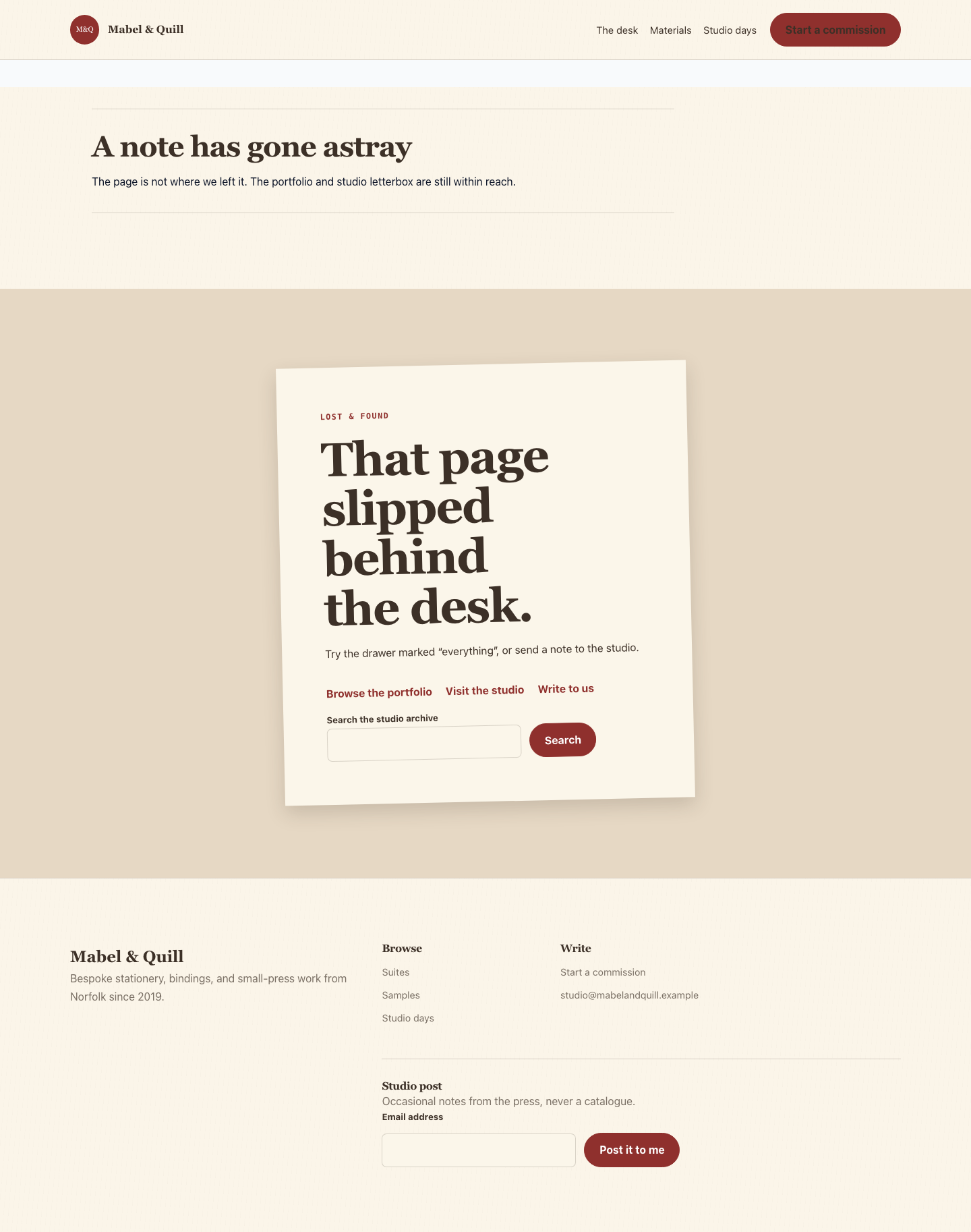 Paperdesk not-found page with a note slipped behind the desk